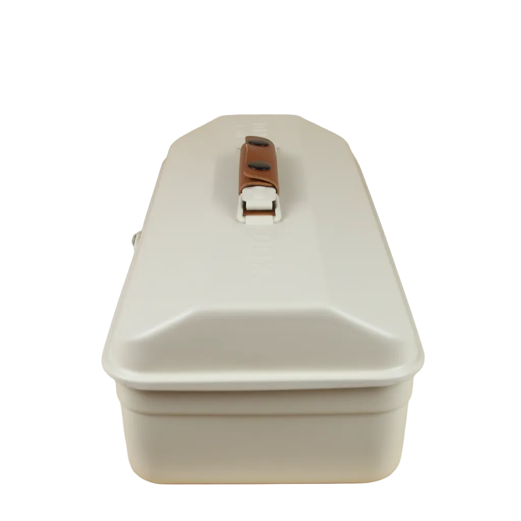 White storage box with a brown handle on a wooden surface